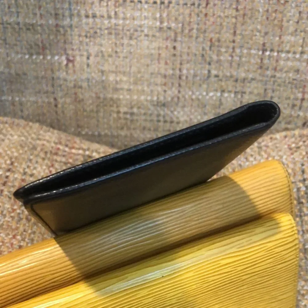 LOUIS VUITTON Black Taiga Leather Long Thin Bifold CC Wallet MI0025